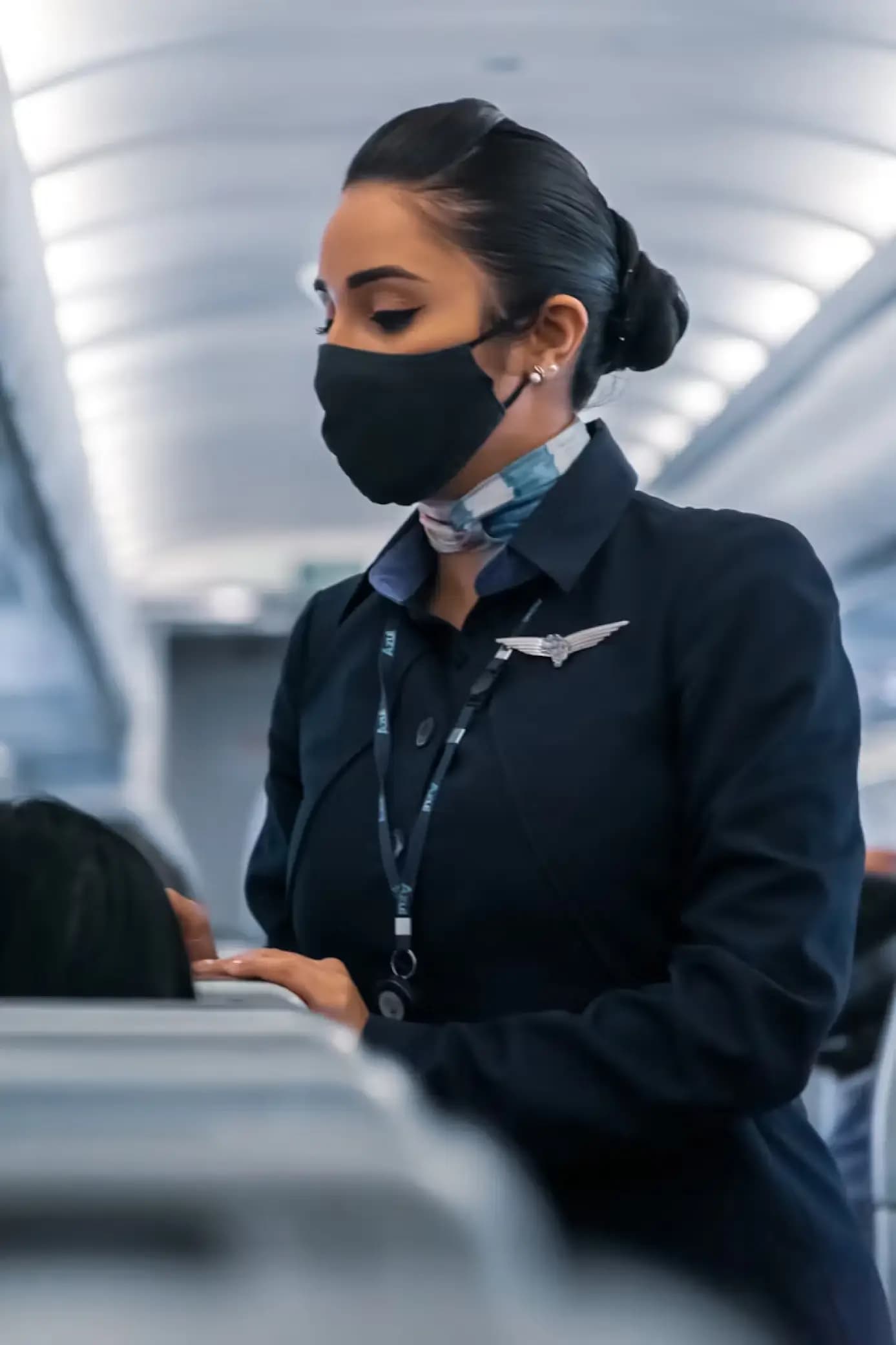 Flight attendant with mask